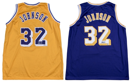 Lot of (2) Magic Johnson Autographed LA Lakers Jerseys - 1 Yellow & 1 Purple (Beckett)
